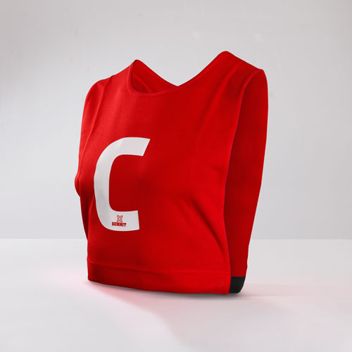 Red Netball Bib with open side and elastic waist straps. Netball bib has a C for Center and ready for netbller to use on court.